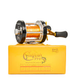 Catfish Pro Fishing For Fun casting reel placed on its yellow packaging box with branding and specifications