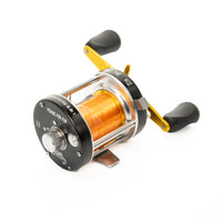 Full top-down view of the Catfish Pro Fishing For Fun casting reel, displaying the spool, handle, and gear system