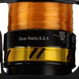 A detailed close-up of the spool on the Catfish Pro Fishing for Fun spinning reel, displaying the gear ratio of 5.2:1 and pre-spooled orange line.