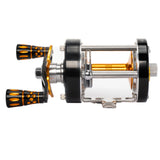 Top view of the Catfish Pro 600CTS Round Baitcaster Reel – Left Handed, emphasizing the lightweight carbon fiber handle and ergonomic knobs.